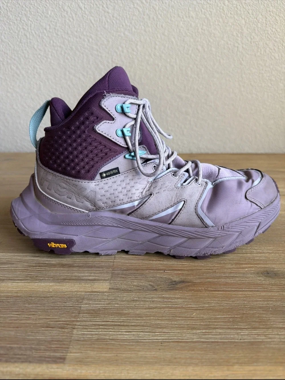 Hoka Lavender and Deep Purple High-Top Trail Sneakers